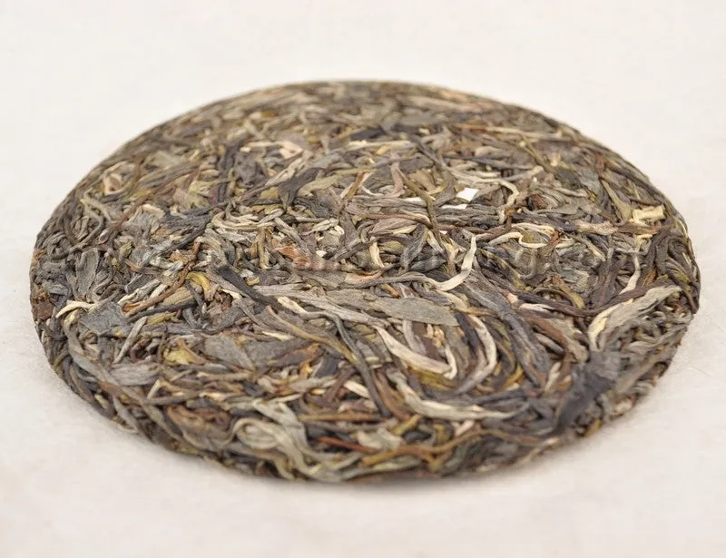 2011 Yunnan Sourcing "Autumn Xi Kong" Yi Wu Pu-erh Tea Cake